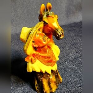 Brown Horse And Cowboy Statue